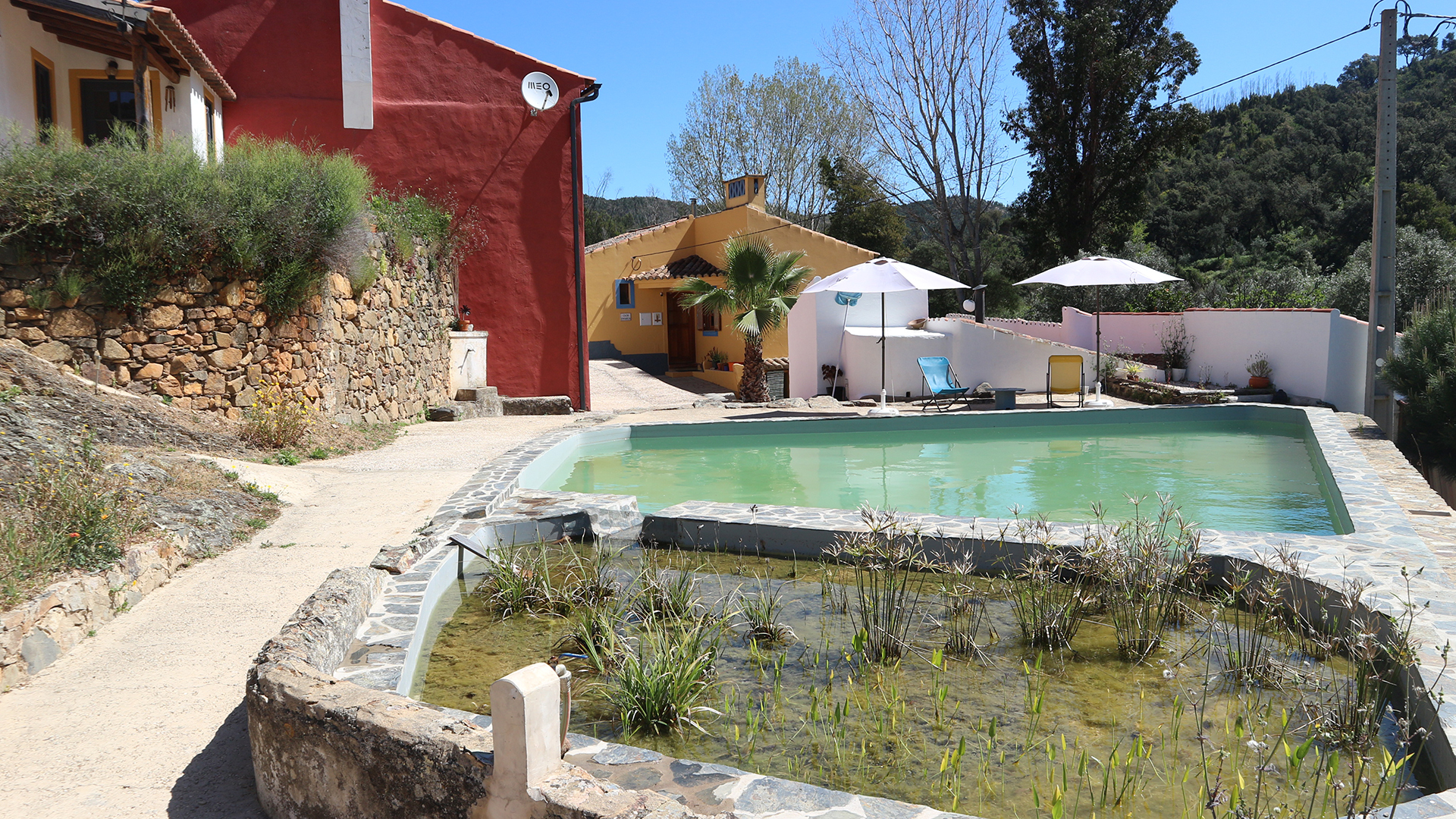 6 Bedroom Country Estate with natural pool in river valley near Monchique | LG2088 This enchanting rural estate of several buildings is located in a peaceful setting with a river running along one border. Perfect as a retreat or place for family and friends to relax.